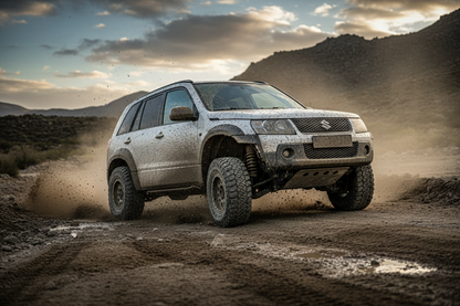 Suzuki Grand Vitara hochgelegt weiß schmutzig